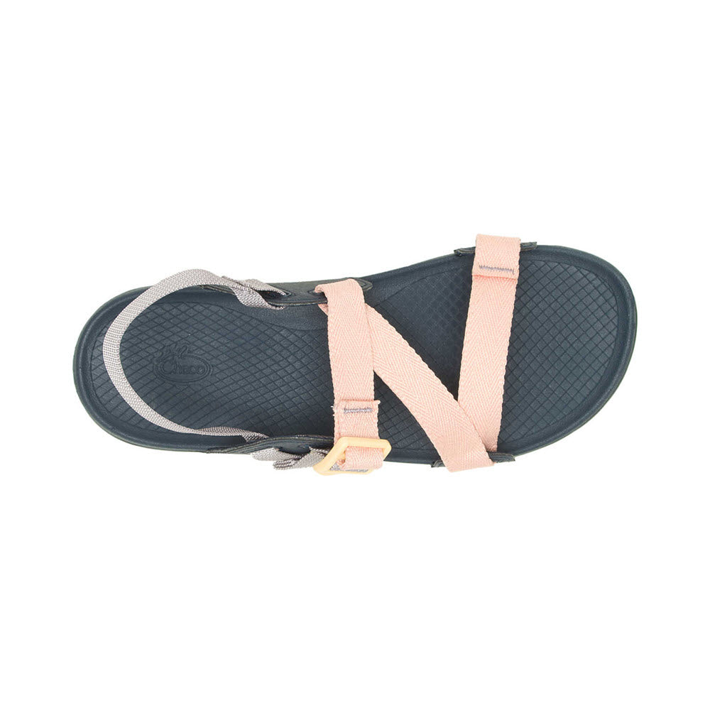 A single CHACO Lowdown Sandal with a thick, black sole and a pastel pink adjustable strap, displayed against a white background.