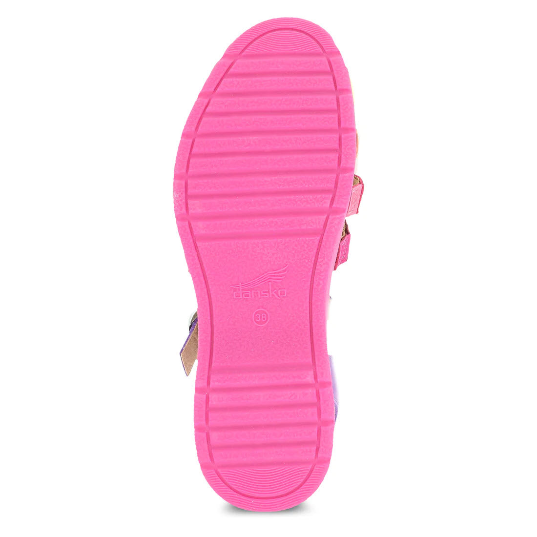 Bright pink DANSKO sole with a ribbed pattern and cute colors on the straps, featuring a visible Dansko logo embossed near the heel.