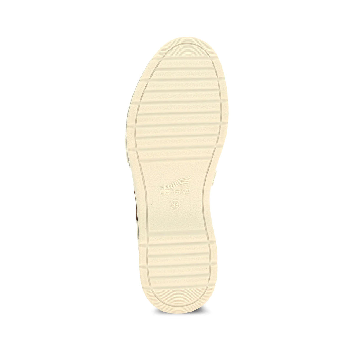 Sole of a light beige Dansko Rissa Ivory sneaker displaying textured patterns and brand embossment.
