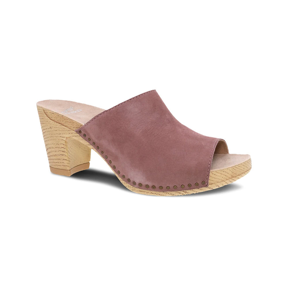 A single Dansko Tandi Rose clog with a chunky wooden heel and studded detailing, displayed against a white background, featuring soft leather uppers.