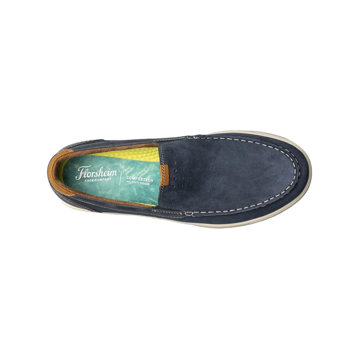 Top-down view of a single navy blue Florsheim Crossover Moc Toe slip-on shoe with contrast stitching and a green interior label.