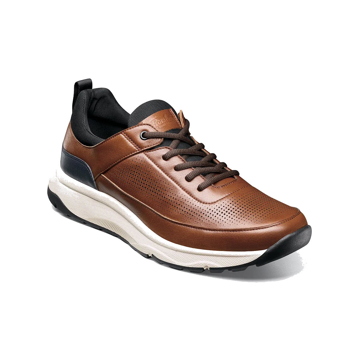 A single brown Florsheim Satellite Perf Elastic Lace Slip On Sneaker with perforated detailing and white soles, isolated on a white background.
