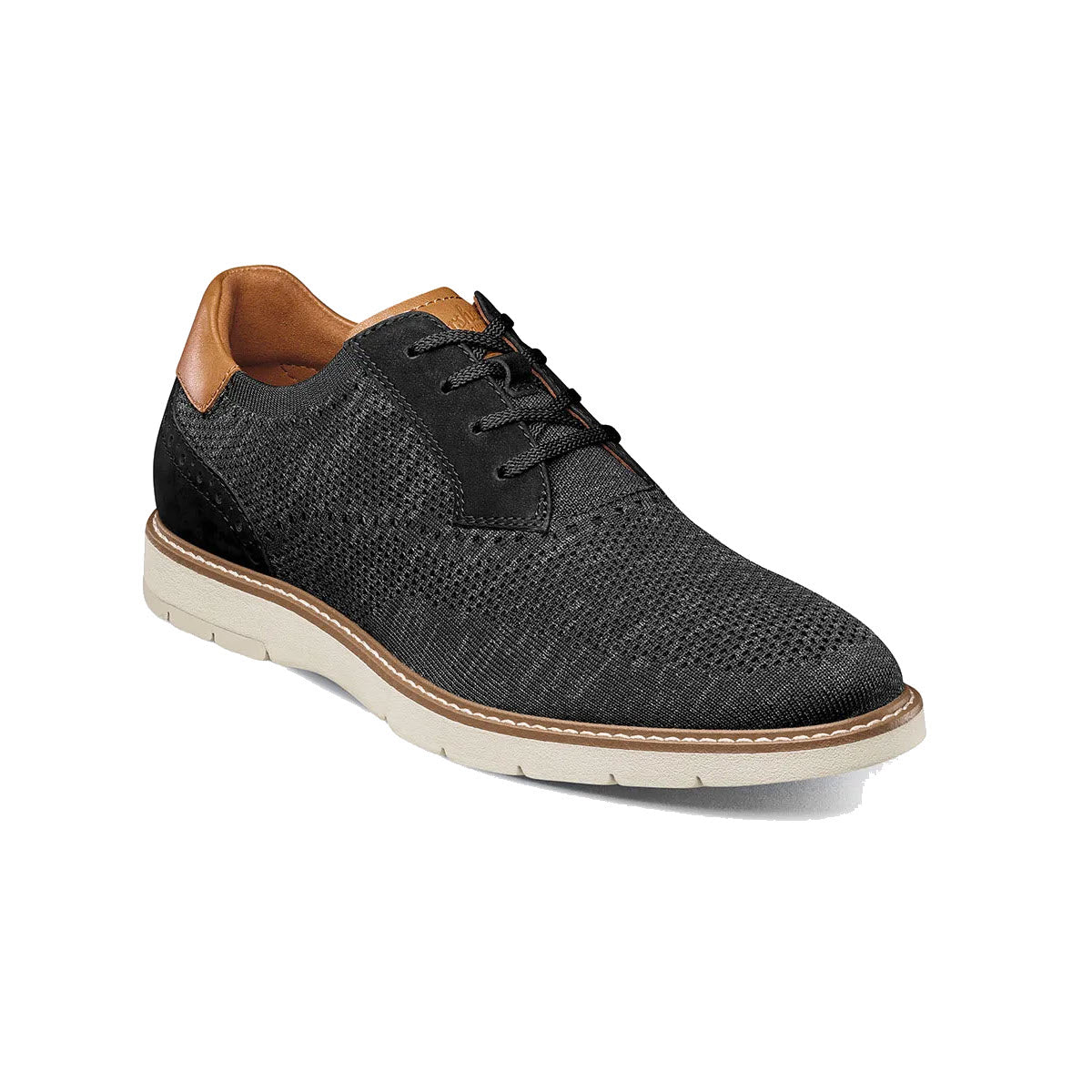 Florsheim Vibe Knit Plain Toe Oxford Black men&#39;s shoe with tan leather lining and a white rubber sole on a white background.