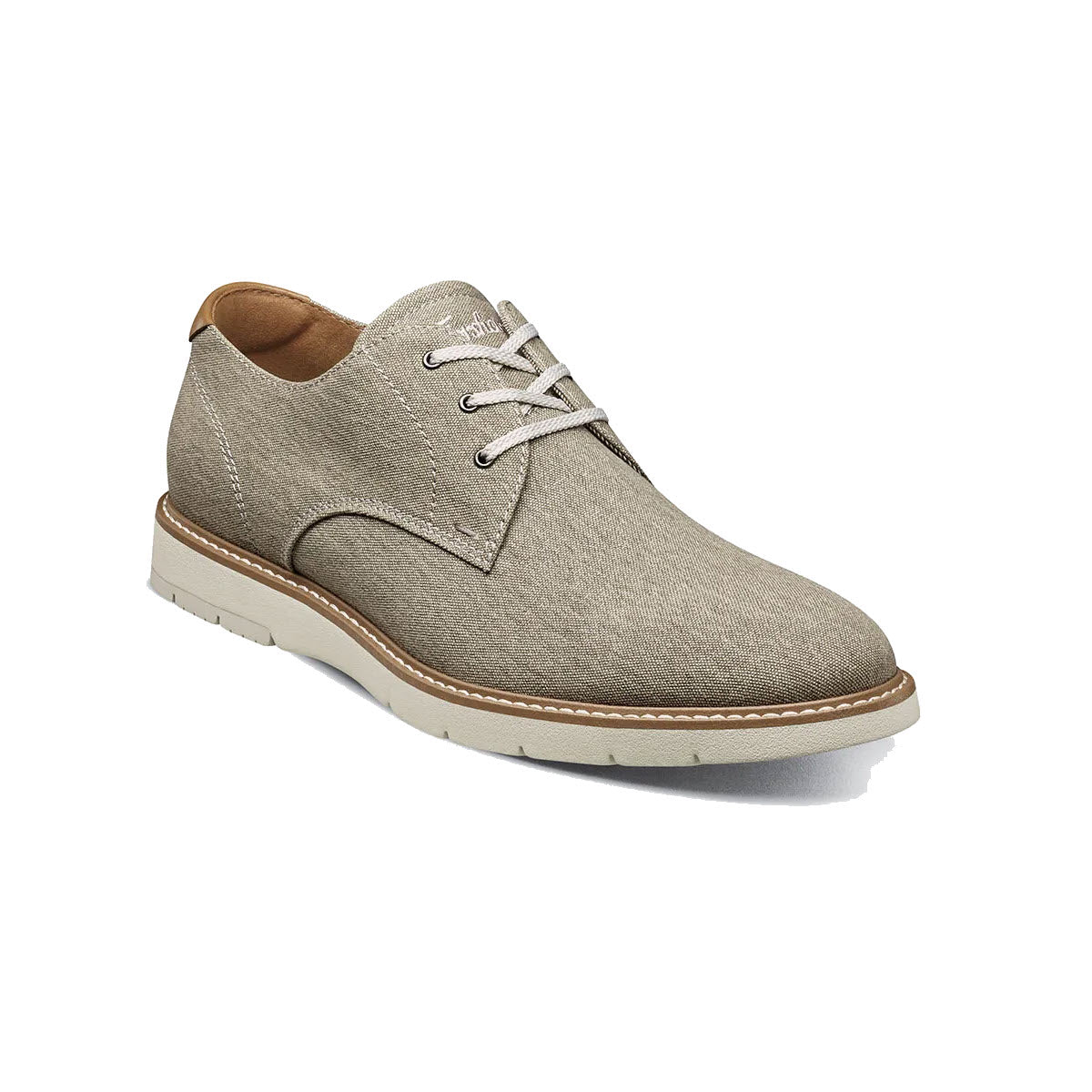 A beige suede Florsheim Plain Toe Oxford with light brown laces on a white background.