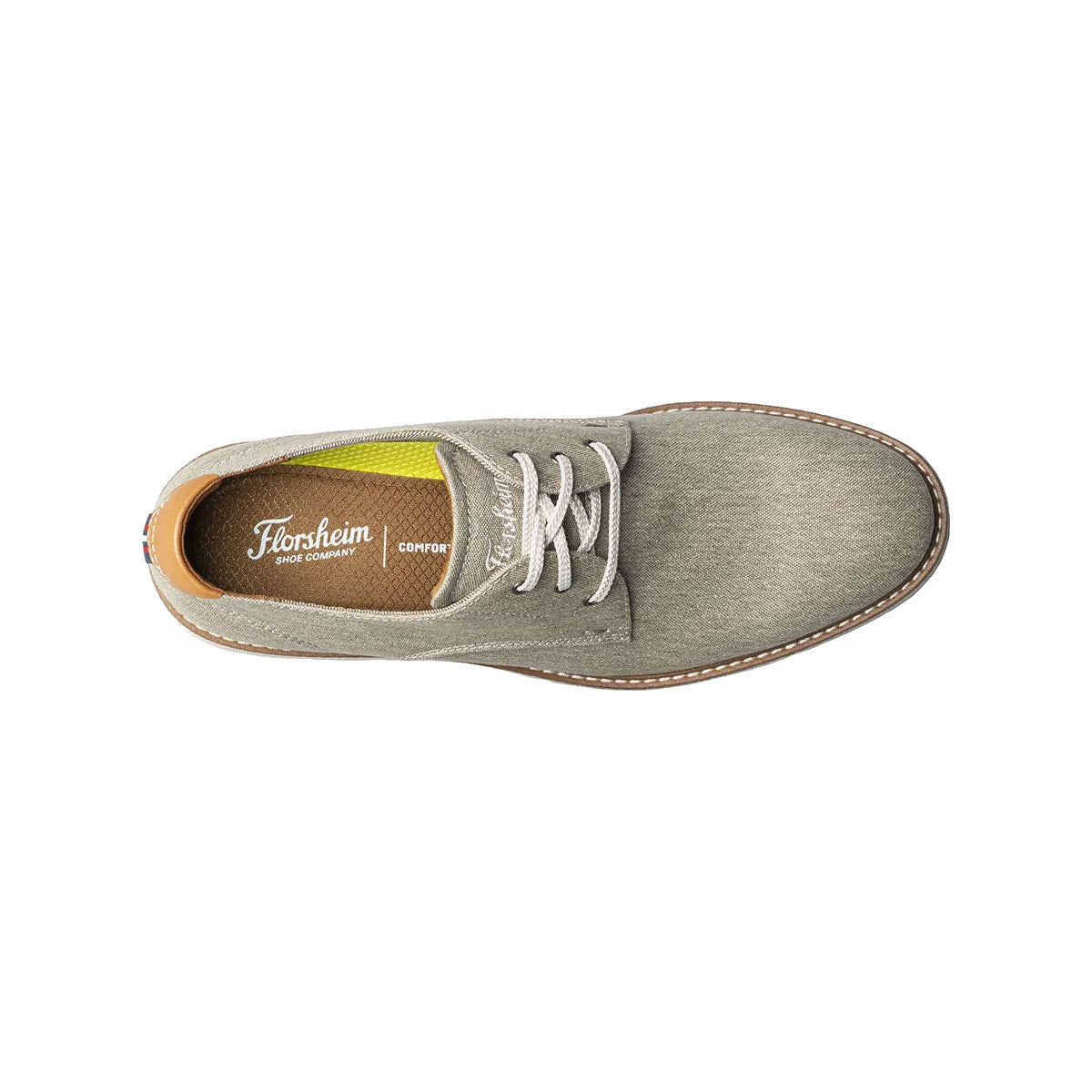 Top view of a Florsheim Vibe Canvas plain toe oxford taupe shoe with white laces and a green inner lining.