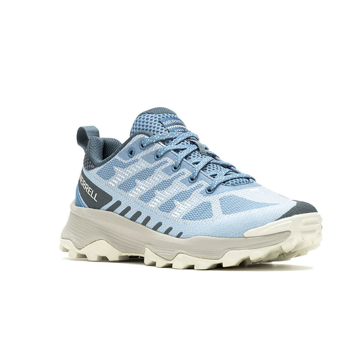 A light blue Merrell Speed Eco Chambray hiking shoe with a white, recycled rubber outsole, featuring a patterned design and lace-up front, isolated on a white background.