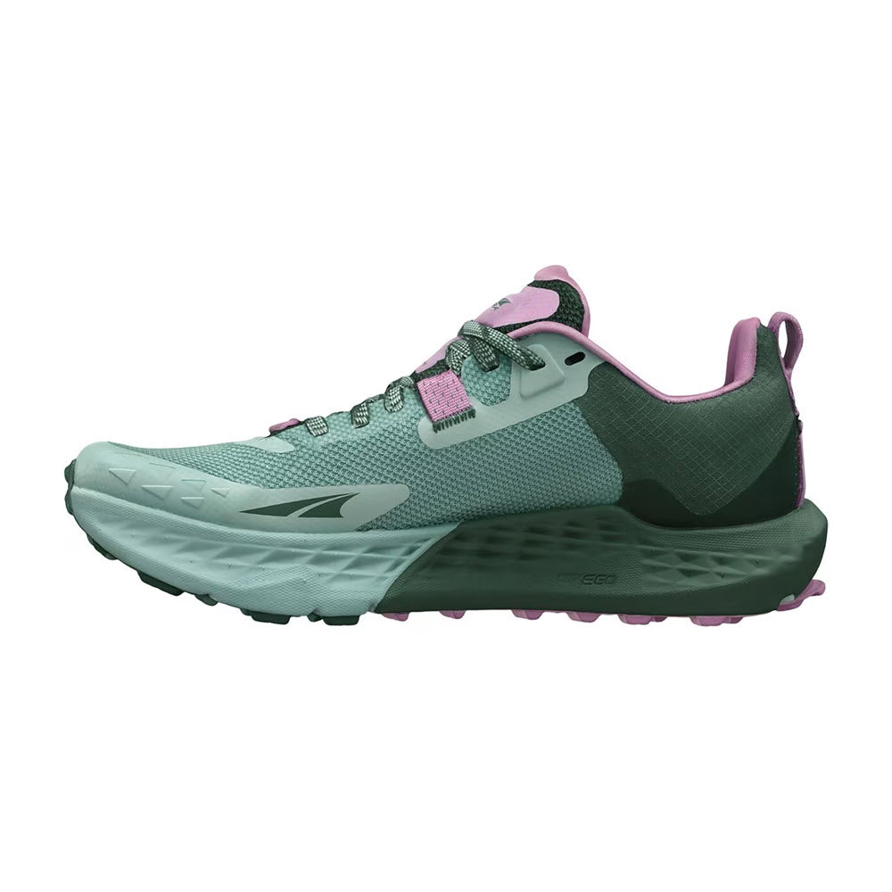 A green and pink Altra Timp 5 trail running shoe with aggressive Vibram® Megagrip outsole and a visible cushioning system.
