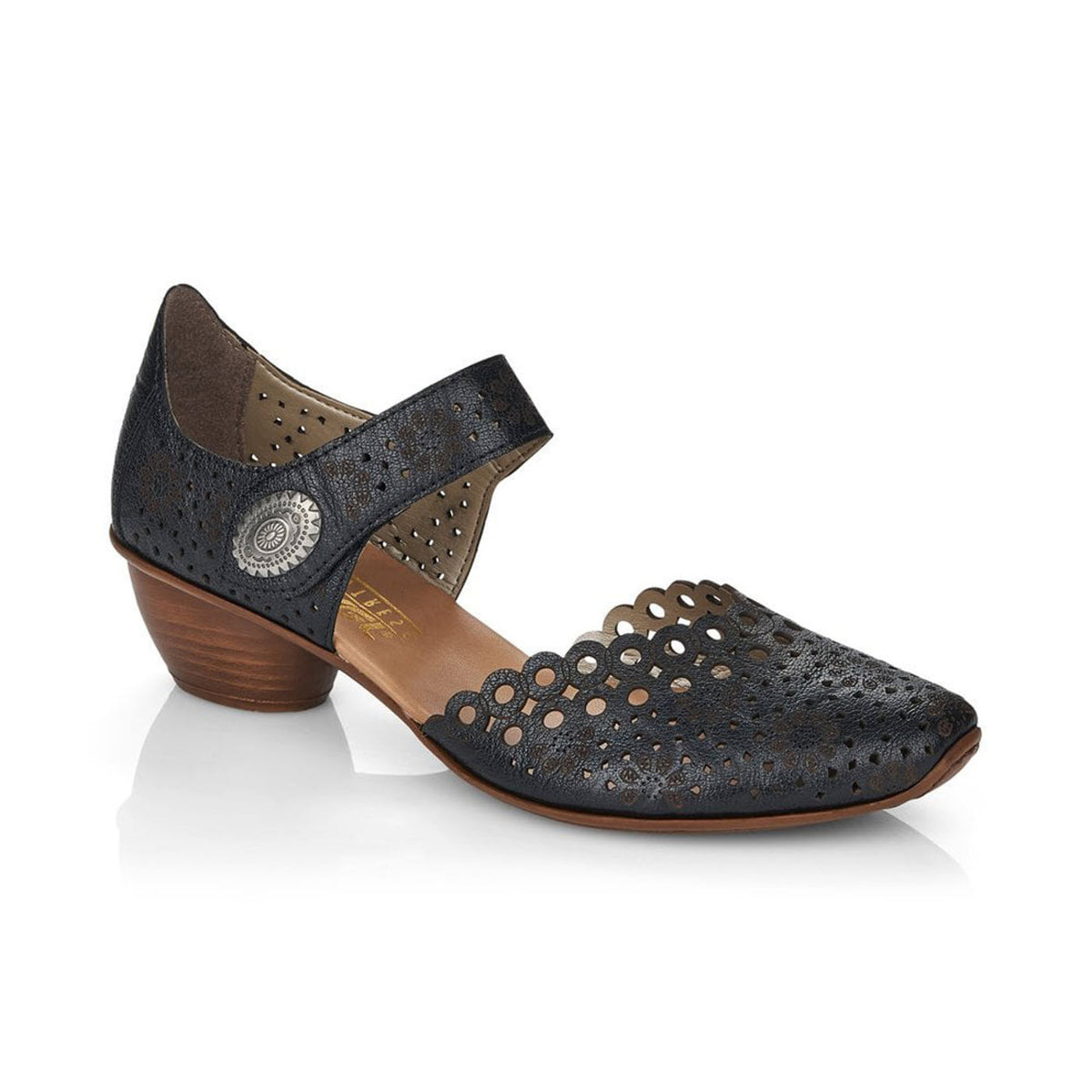 A navy blue Rieker women&#39;s shoe with a low heel and laser-cut design, featuring a round embellishment and an adjustable ankle strap.
