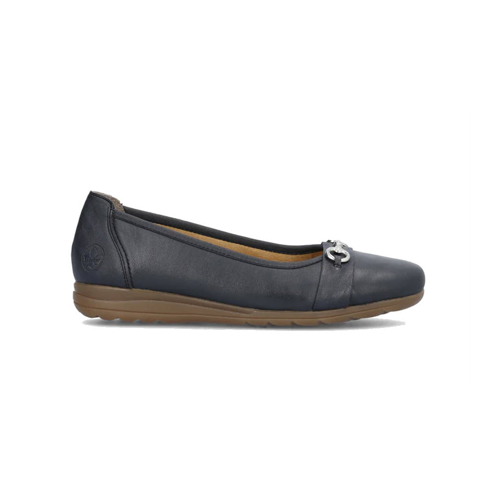 A single Rieker navy blue leather ballet flat shoe with a small metallic buckle on the toe and a rubber sole, displayed against a white background.