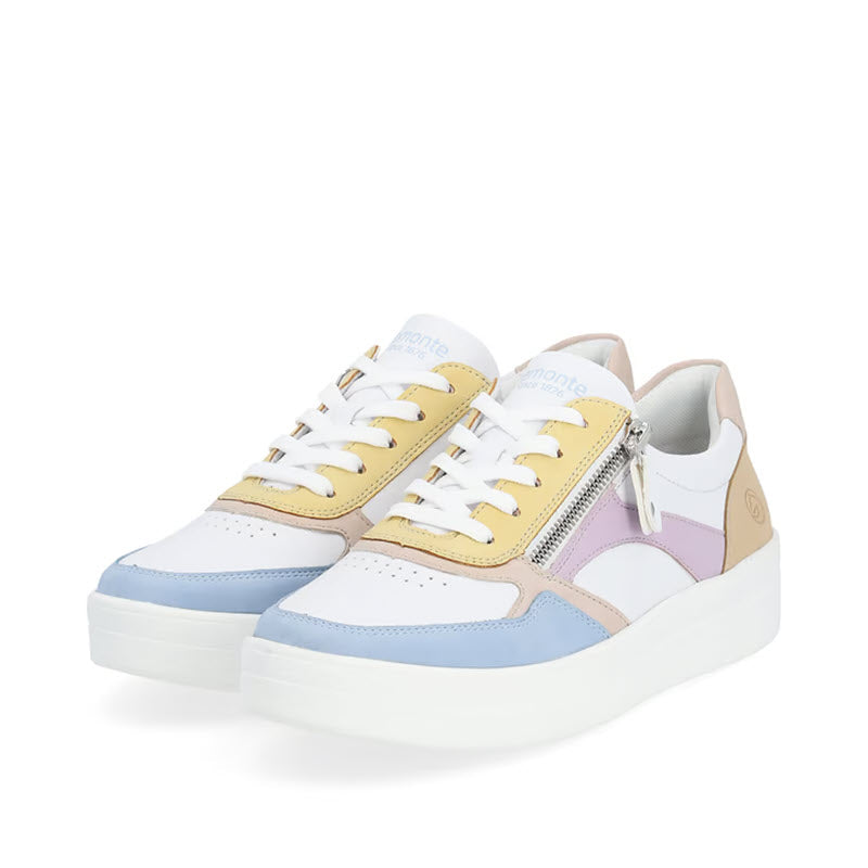 A pair of multicolored, smooth leather sneakers featuring white, yellow, light blue, and pastel purple accents with white laces and a zipper detail on the side. These stylish REMONTE EURO COURT SNEAKER PASTEL MULTI - WOMENS by Remonte are designed with Lite &#39;n Soft technology for ultimate comfort.
