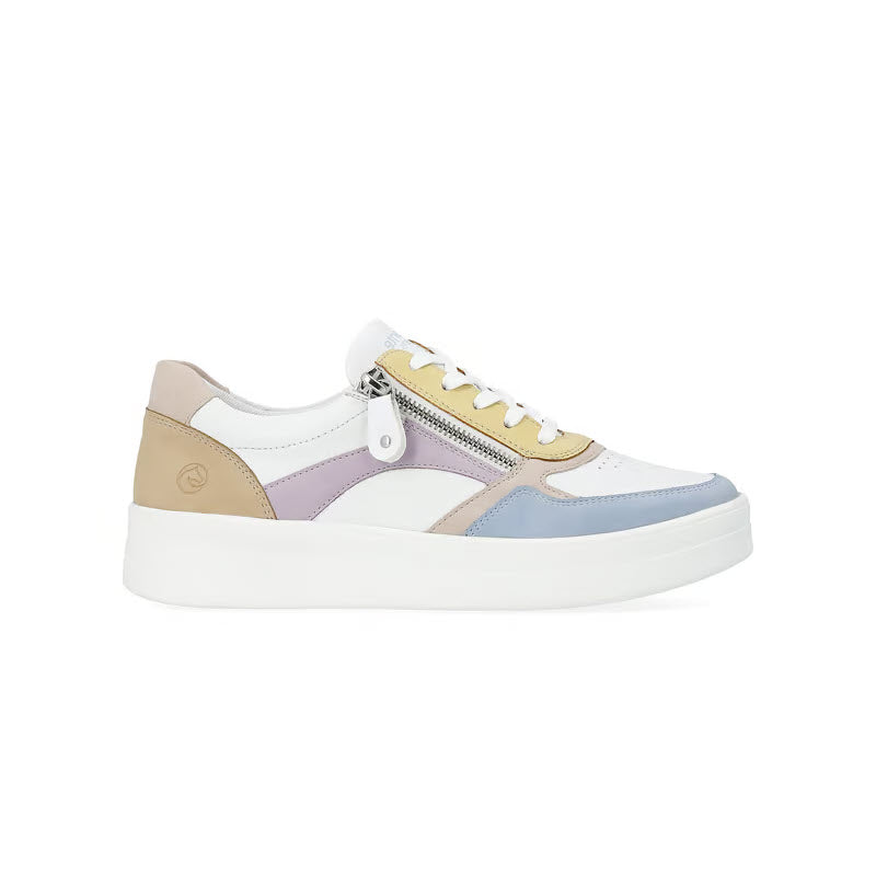 A stylish multi-colored sneaker with a white sole featuring smooth leather, a zipper detail on the side, and a mixture of pastel colors including yellow, beige, lavender, and blue. The REMONTE EURO COURT SNEAKER PASTEL MULTI - WOMENS incorporates Lite &#39;n Soft technology for ultimate comfort.