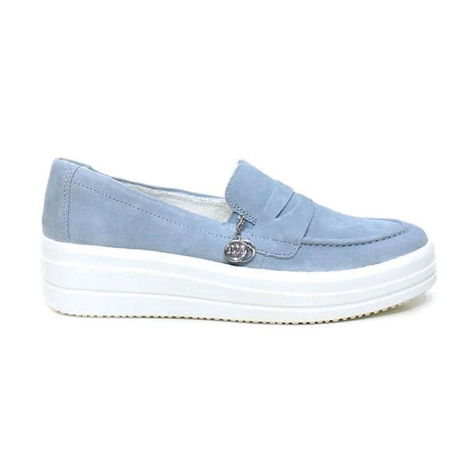 A stylish REMONTE EURO SNEAKER LOAFER BLUE - WOMENS by Remonte featuring a light blue suede upper, complemented by a white platform sole and a small metallic charm on the side.