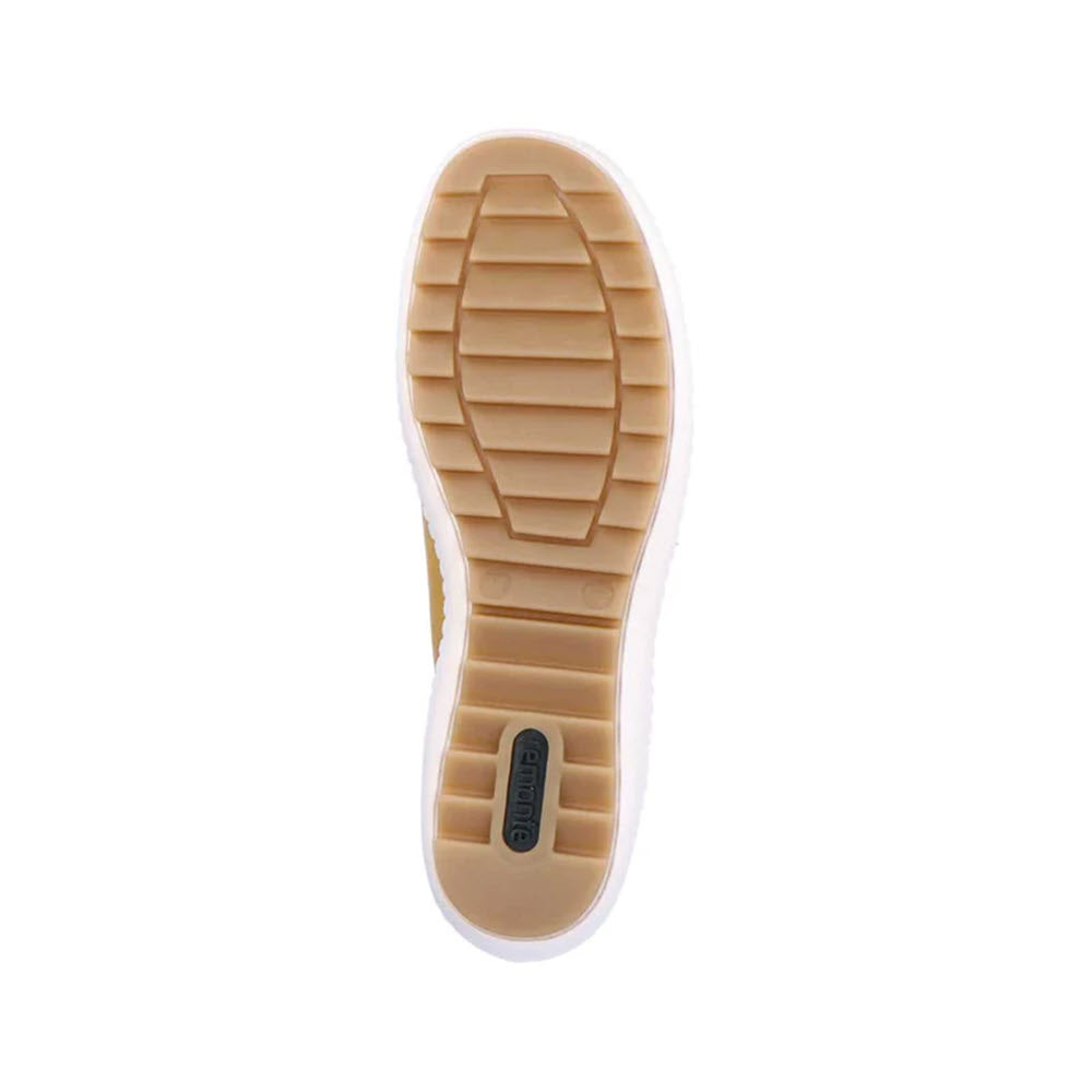 Bottom view of a REMONTE EURO CITY WALKER MUSTARD shoe sole featuring a tread pattern with segmented blocks and metallic elements, along with a small rectangular Remonte logo in the middle.
