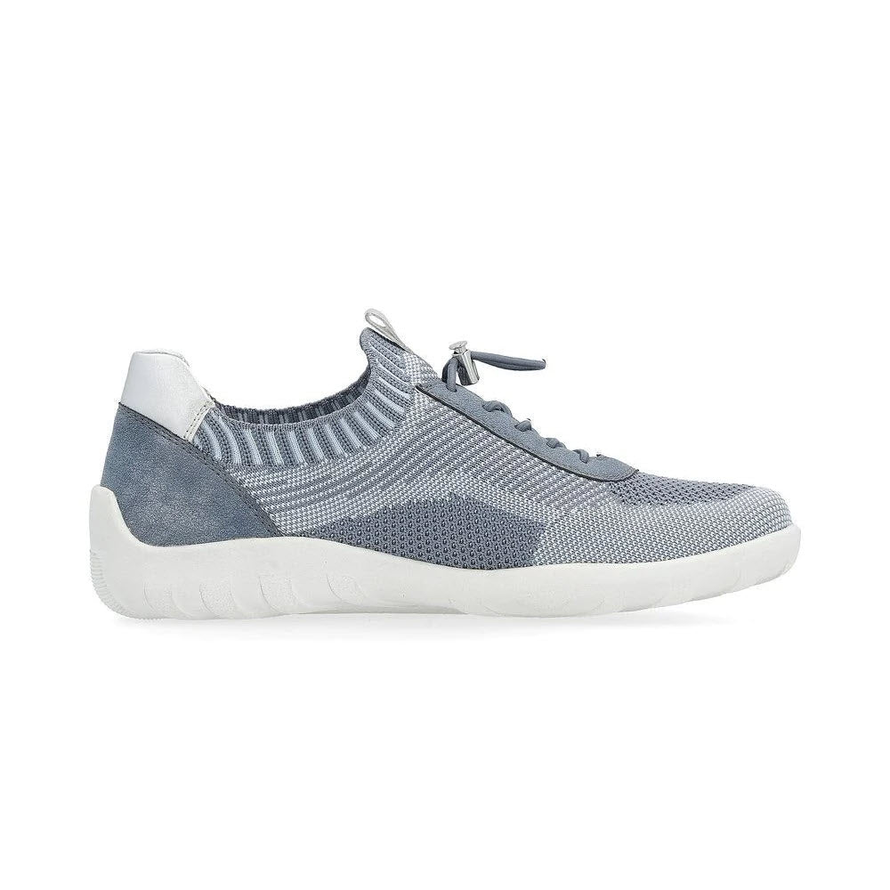 A single Remonte Lite &amp; Soft sneaker denim for women with a bungee lacing system and a white rubber sole, displayed against a white background.