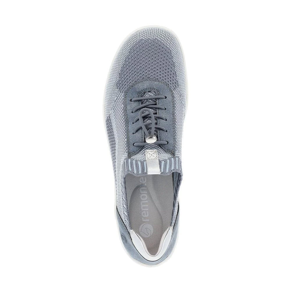 Top view of a single gray women&#39;s sneaker, REMONTE LITE &amp; SOFT SNEAKER DENIM - WOMENS, with a knit upper and lacing system, displayed against a white background.
