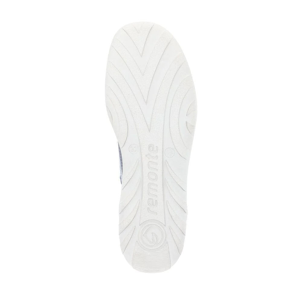 White REMONTE LITE &amp; SOFT SNEAKER DENIM sole with textured patterns and the brand name &quot;Remonte&quot; embossed in the center.