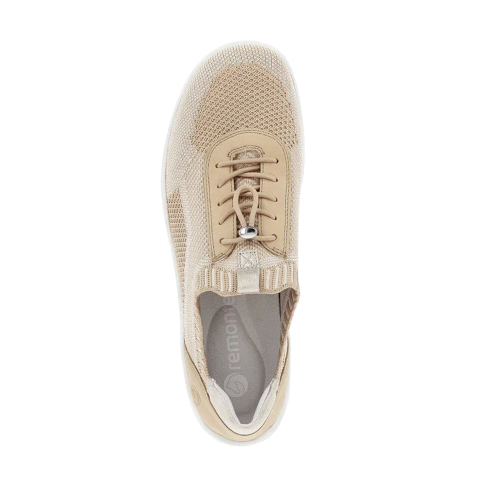 A top view of a beige **REMONTE LITE &amp; SOFT SNEAKER VANILLA - WOMENS** with a white sole and mesh upper, featuring an elastic band for easy wear, characterized by a lace-up design and a Remonte logo label on the insole.