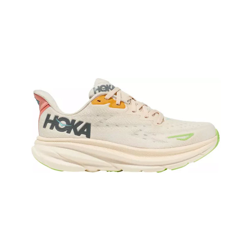 Side view of a Hoka CLIFTON 9 VANILLA/ASTRAL running shoe, featuring a white and pale peach upper with the Hoka logo on a white background, incorporating responsive new foam.
