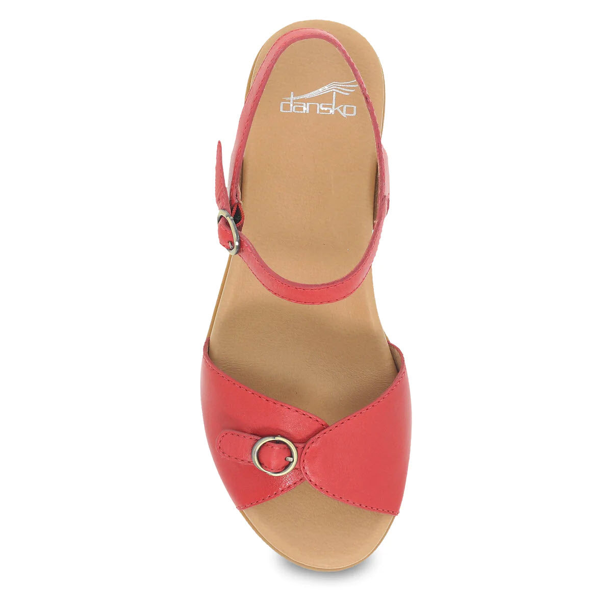 A top view of a red Dansko Tessie Poppy heeled sandal with a tan insole, featuring a circular buckle and an ankle strap on a white background.