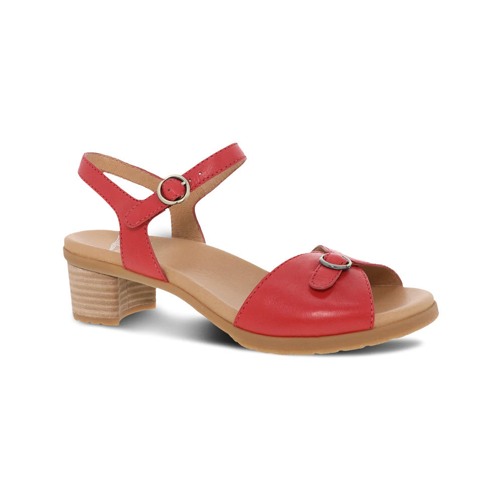 Dansko red leather heeled sandal with a buckle strap and a chunky wooden heel, isolated on a white background.