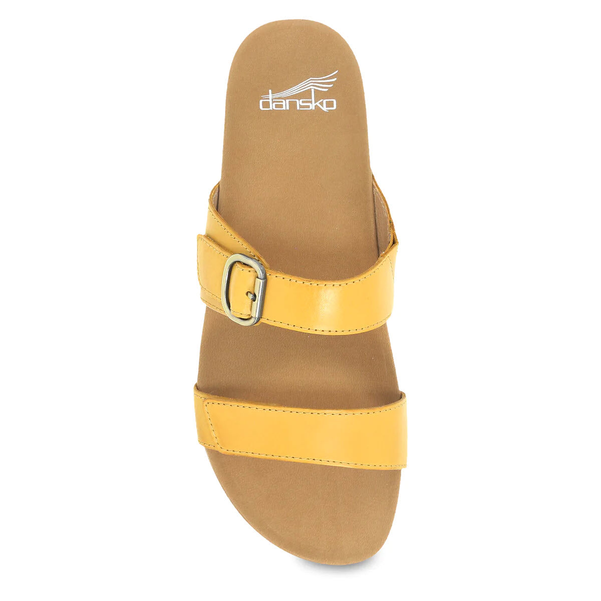 A top view of a yellow Dansko Justine slide sandal with two straps and a buckle, isolated on a white background.