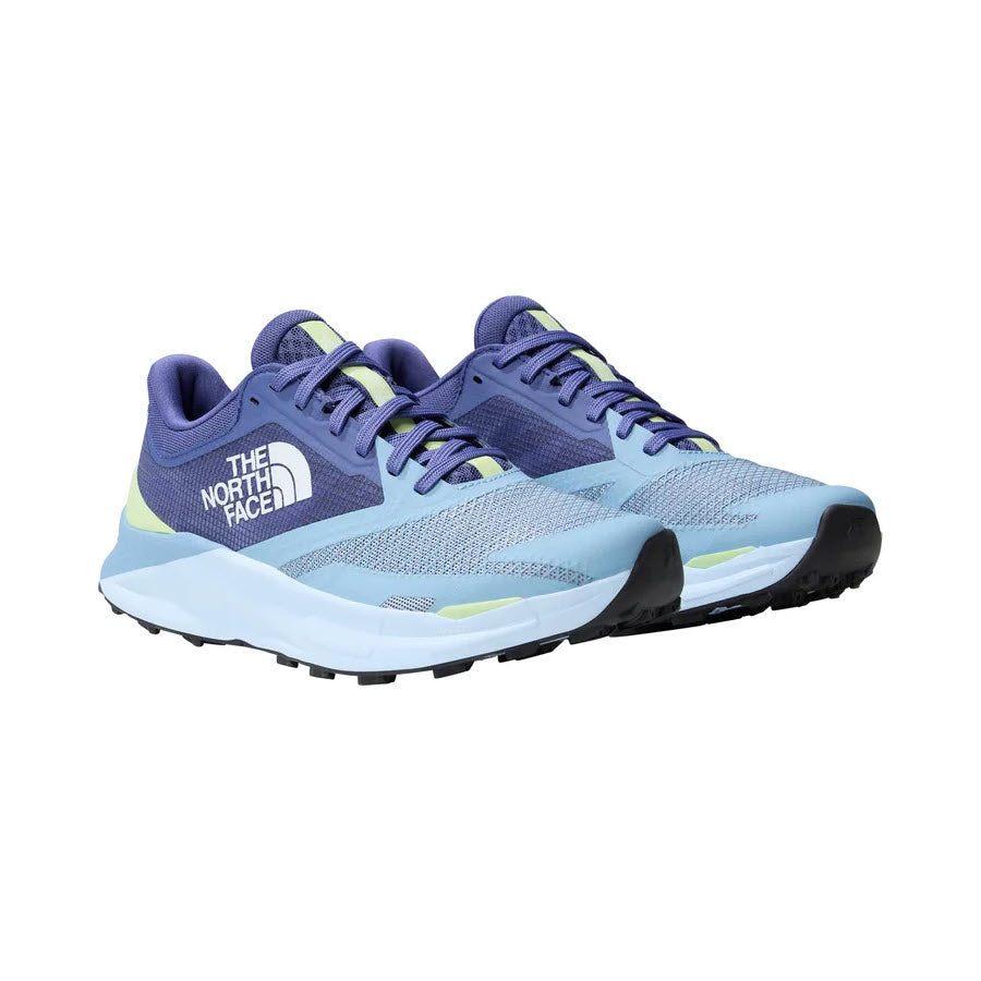 A pair of the NORTH FACE VECTIV ENDURIS 3 trail running shoes in shades of blue and light green, featuring mesh fabric and rugged soles enhanced with VECTIV technology.