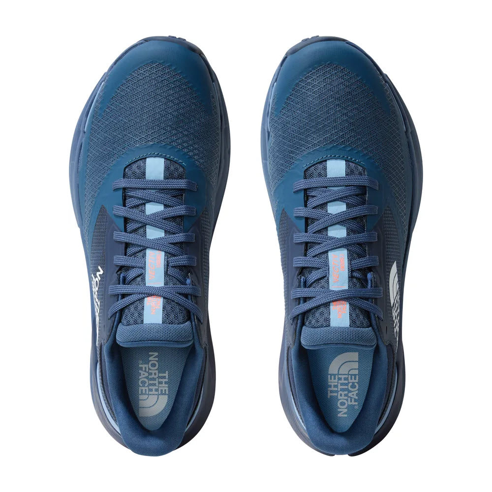 Top view of a pair of North Face VECTIV ENDURIS 3 SHADY BLUE/SUMMIT NAVY trail running shoes equipped with VECTIV technology, showing the lace-up design and brand logos.