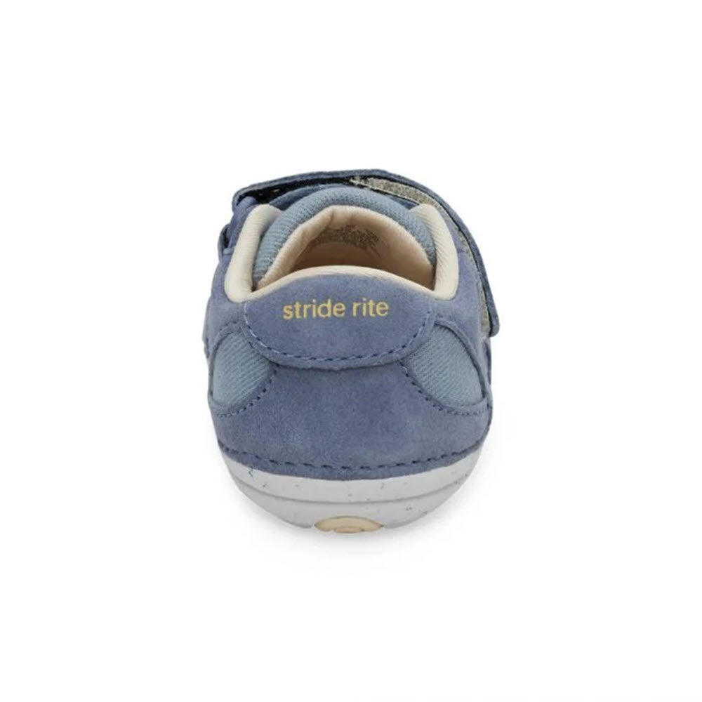 Blue Stride Rite toddler shoe with velcro straps and a memory foam interior, viewed from the back, displaying the &quot;Stride Rite&quot; logo.