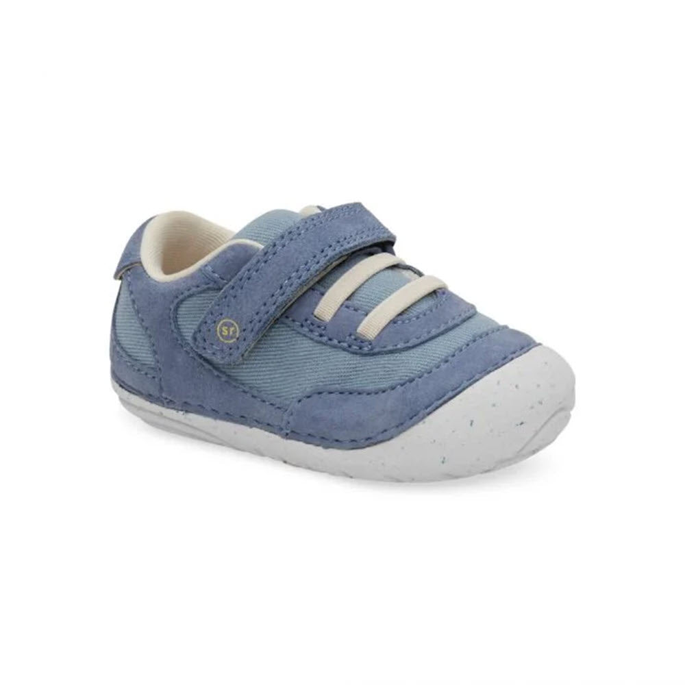 A Stride Rite blue toddler shoe with velcro straps and a memory foam interior, featuring a white speckled sole on a plain white background.