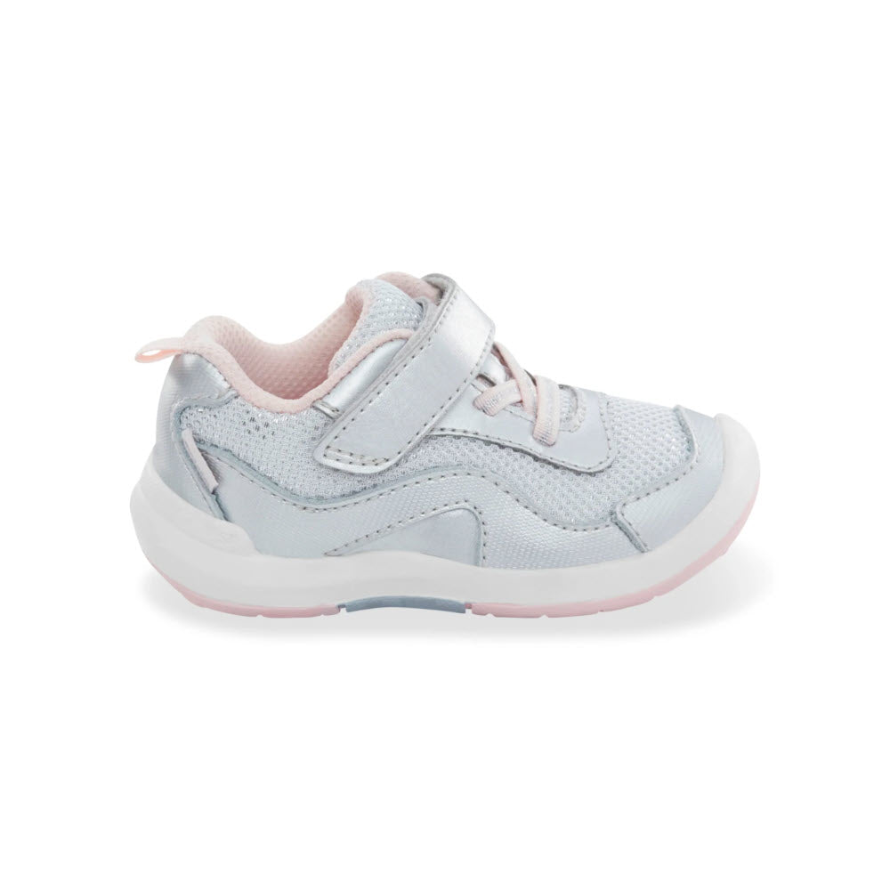 A single toddler-sized Stride Rite SRT Winslow 2.0 Silver Kids sneaker in light blue and pink colors, featuring velcro straps, displayed on a white background.