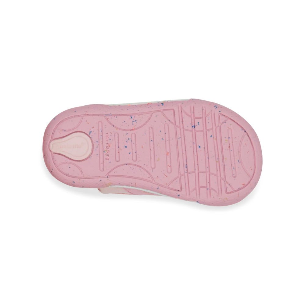 Stride Rite SR Fern Pink sneakers sole with speckled pattern on a white background.