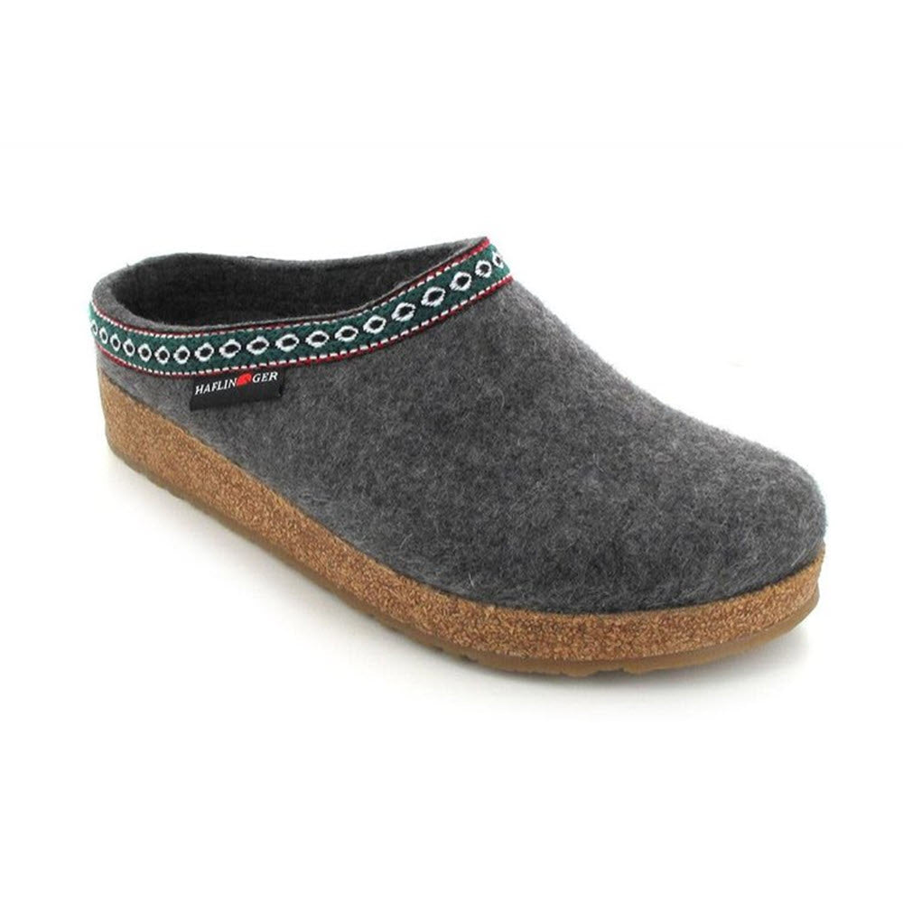 Gray felt clog with a decorative multicolored band near the rim and a cork sole, crafted by Haflingers, isolated on a white background.
