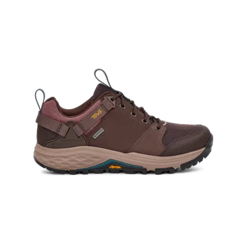 A single brown waterproof hiking shoe with a Vibram sole, labeled prominently on the side and featuring light brown accents and lace-up closure. 
(Product: TEVA GRANDVIEW GTX LOW BRACKEN/BURLWOOD - WOMENS, Brand: Teva)