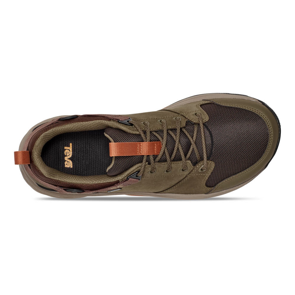 Top view of a single brown Teva Grandview GTX Low Rainforest Brown/Dark hiking shoe with laces and a black and orange pull tab.