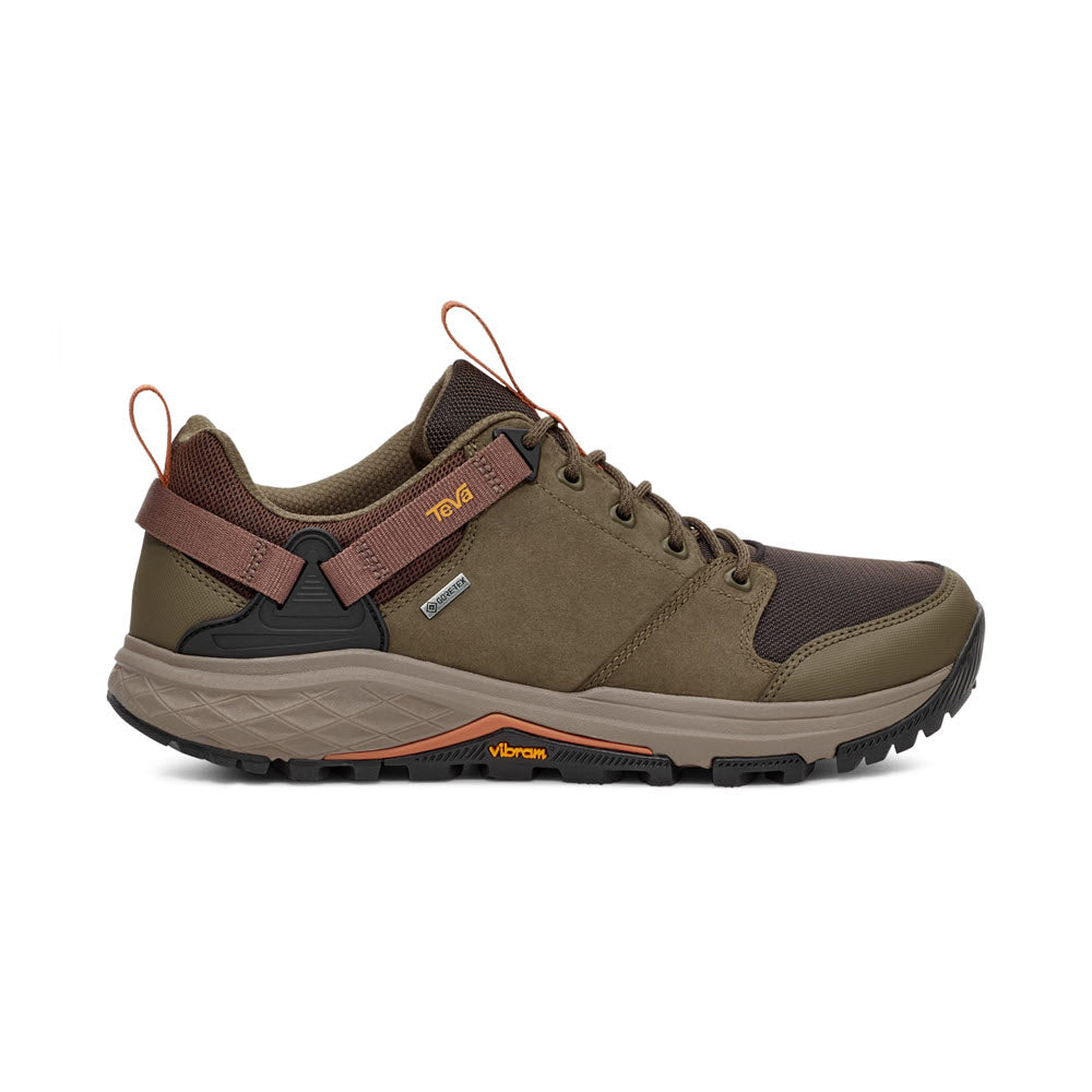 A single Teva Grandview GTX Low Rainforest Brown/Dark hiking shoe with orange accents and a Vibram Megagrip outsole isolated on a white background.