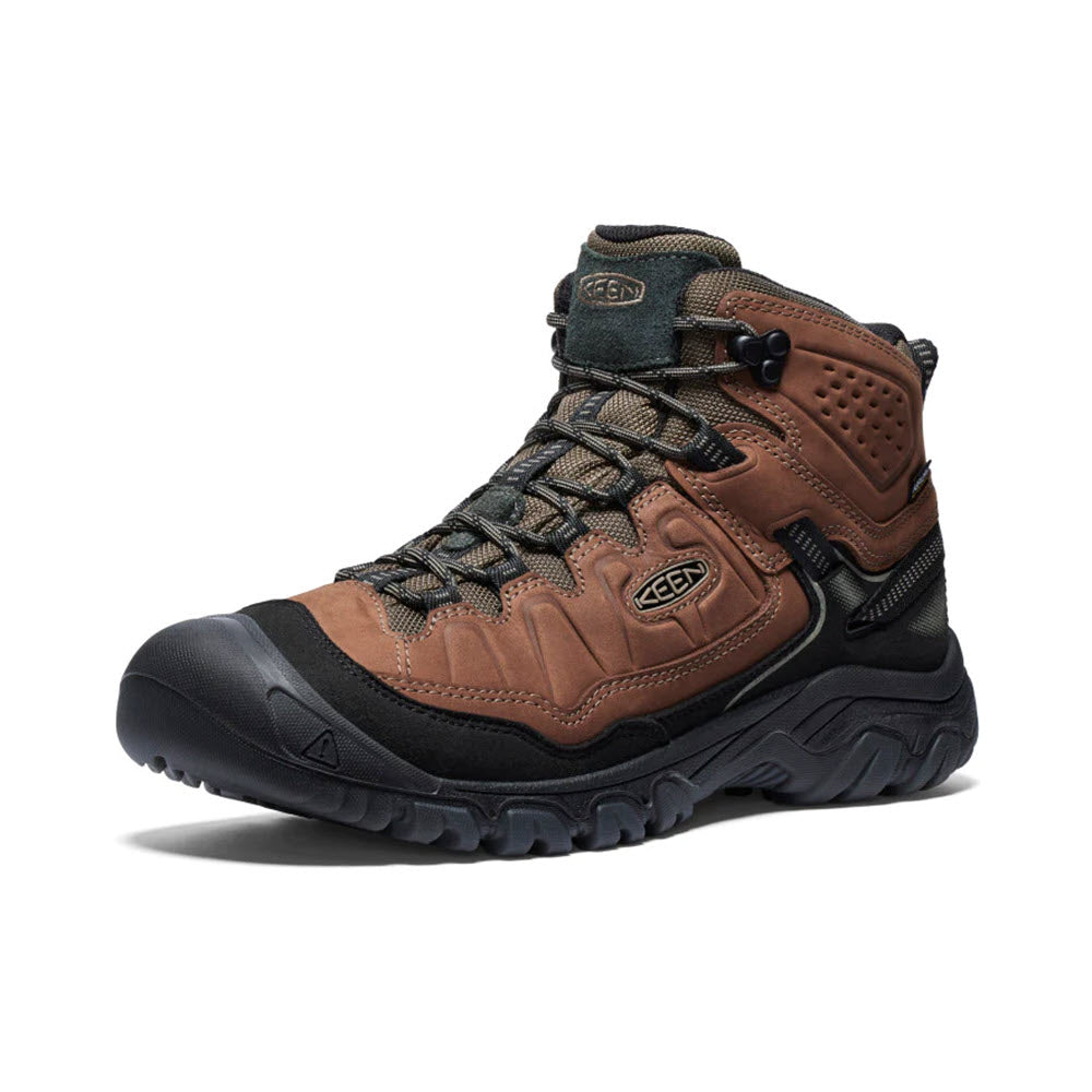 Men&#39;s durable brown Keen Targhee IV Mid Waterproof hiking boot on a white background.