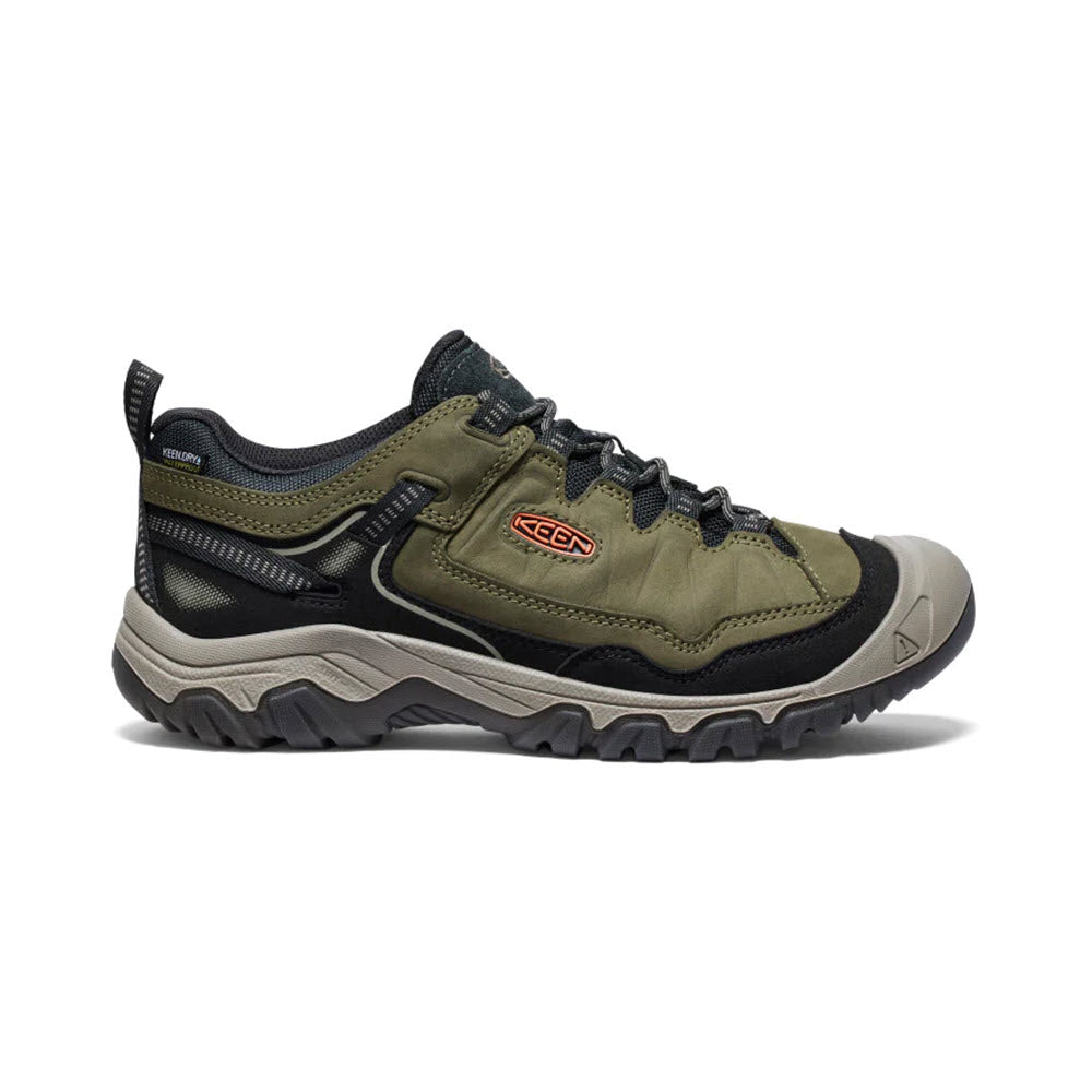 A single dark olive Keen Targhee IV WP hiking shoe featuring a sturdy rubber sole and black and gray detailing, displayed on a white background.