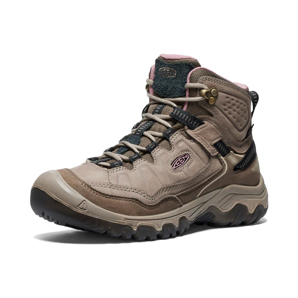 A single light brown Keen Targhee IV Mid WP Brindle/Nostalgia Rose hiking boot with dark accents and thick soles, displaying a prominent logo on the side.