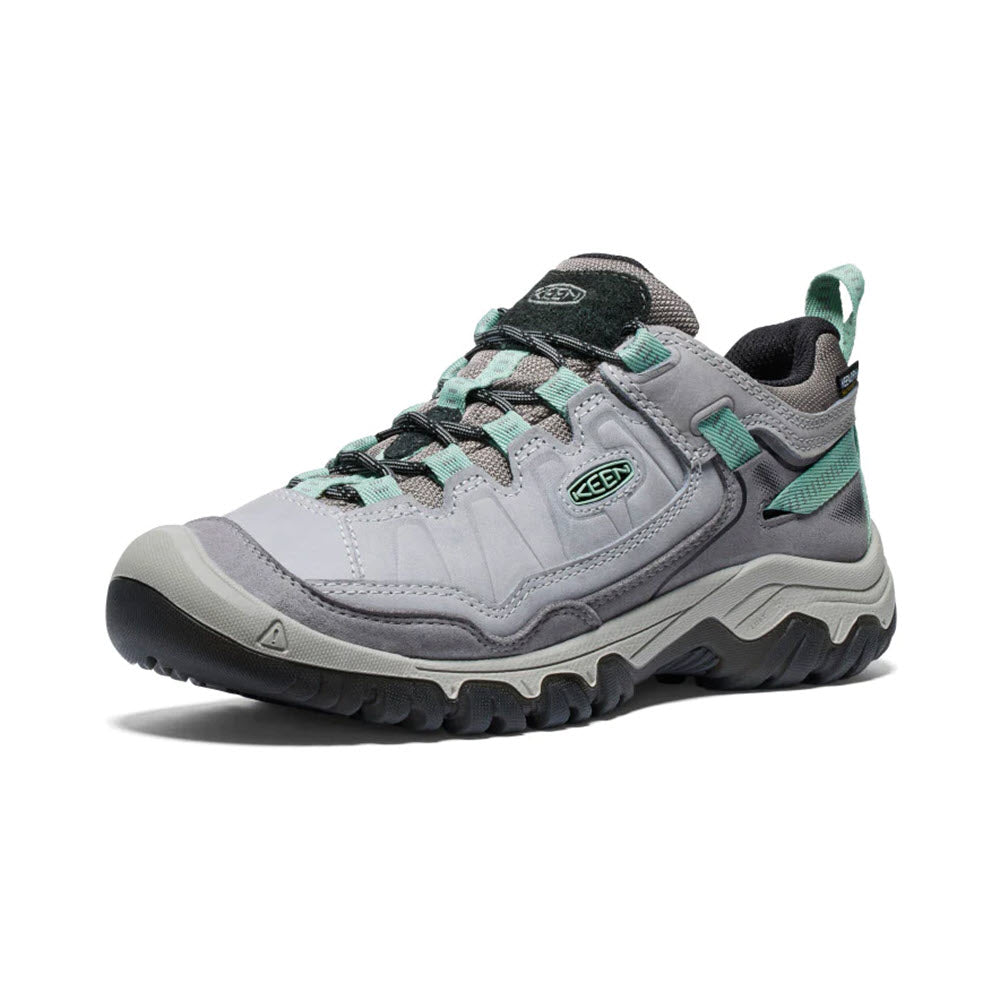 A single gray and green Keen Targhee IV WP Alloy hiking shoe with a durable Targhee sole and bungee lacing displayed on a white background.
