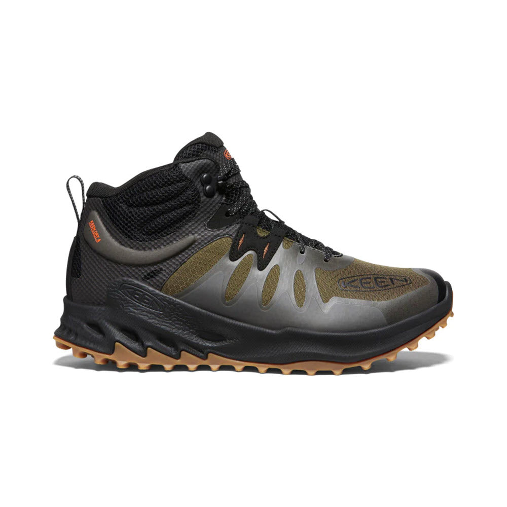 A single Keen Zionic hiking boot on a white background, featuring gray and black colors with orange accents and a distinctive Zionic rugged sole.