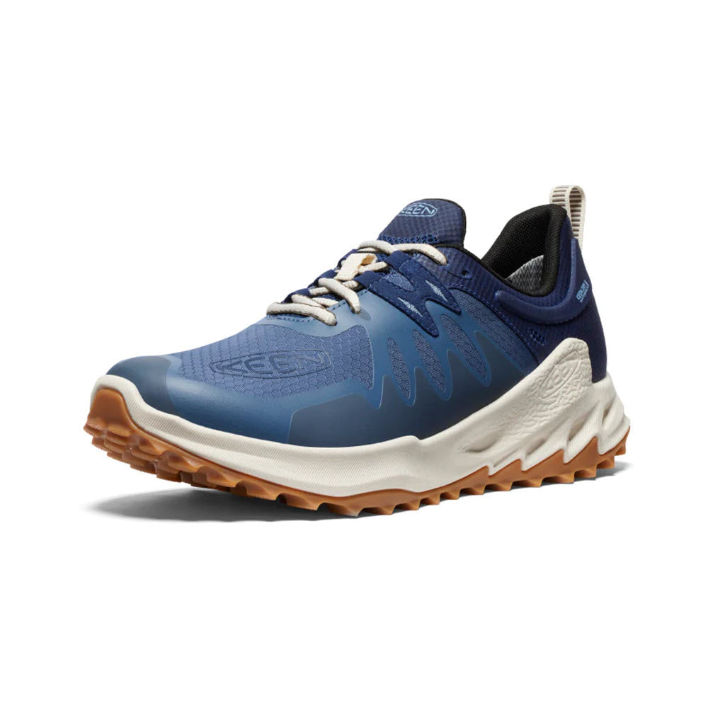 A single blue and brown Keen Zionic trail running shoe viewed at a side angle on a white background.