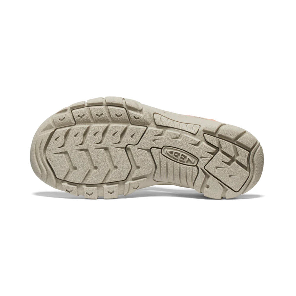 Sole of a beige Keen Newport H2 Cork sandal showing tread pattern and brand logo.