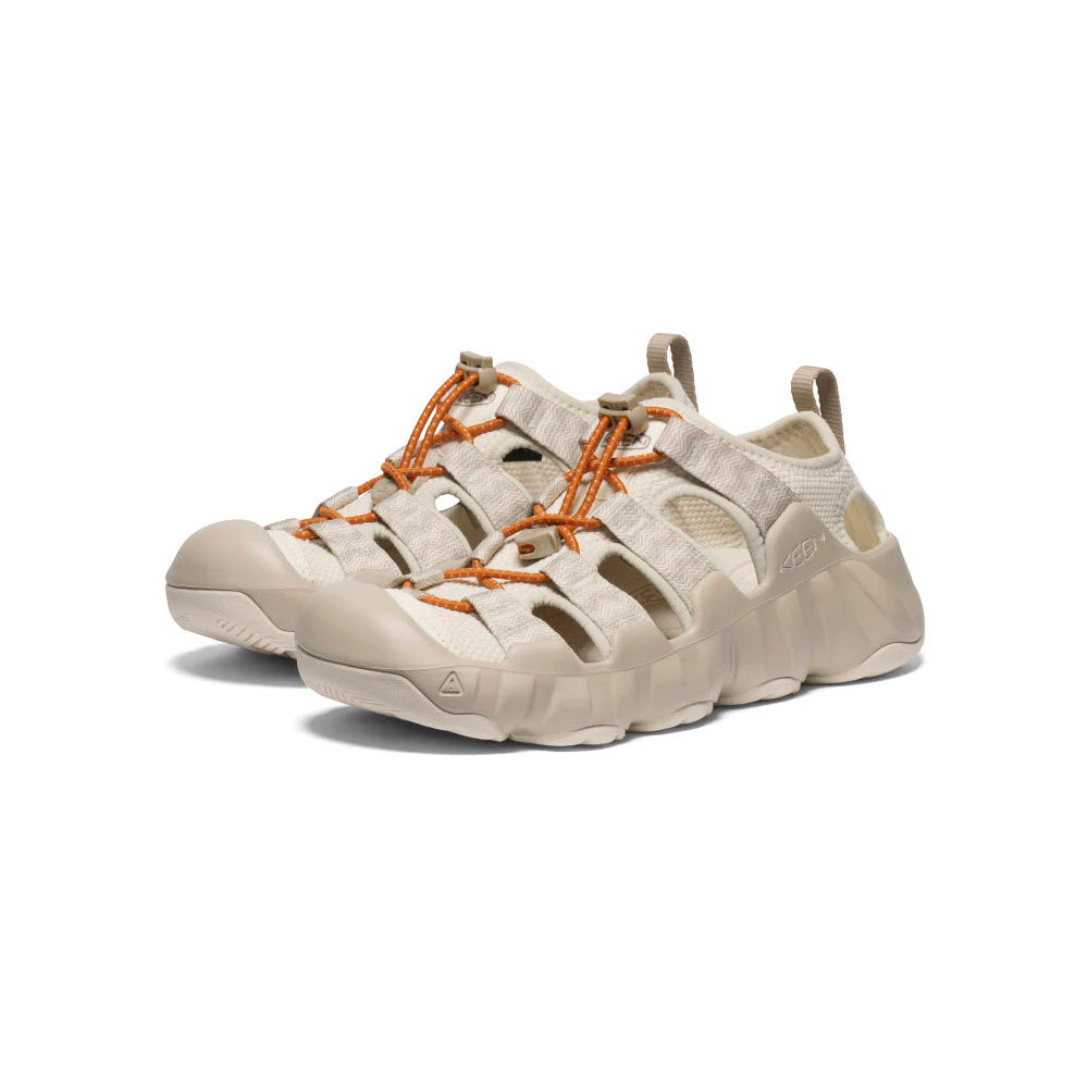A pair of beige Keen Hyperport H2 Birch/Plaza Taupe hiking sandals with orange laces and maximal cushioning on a white background.