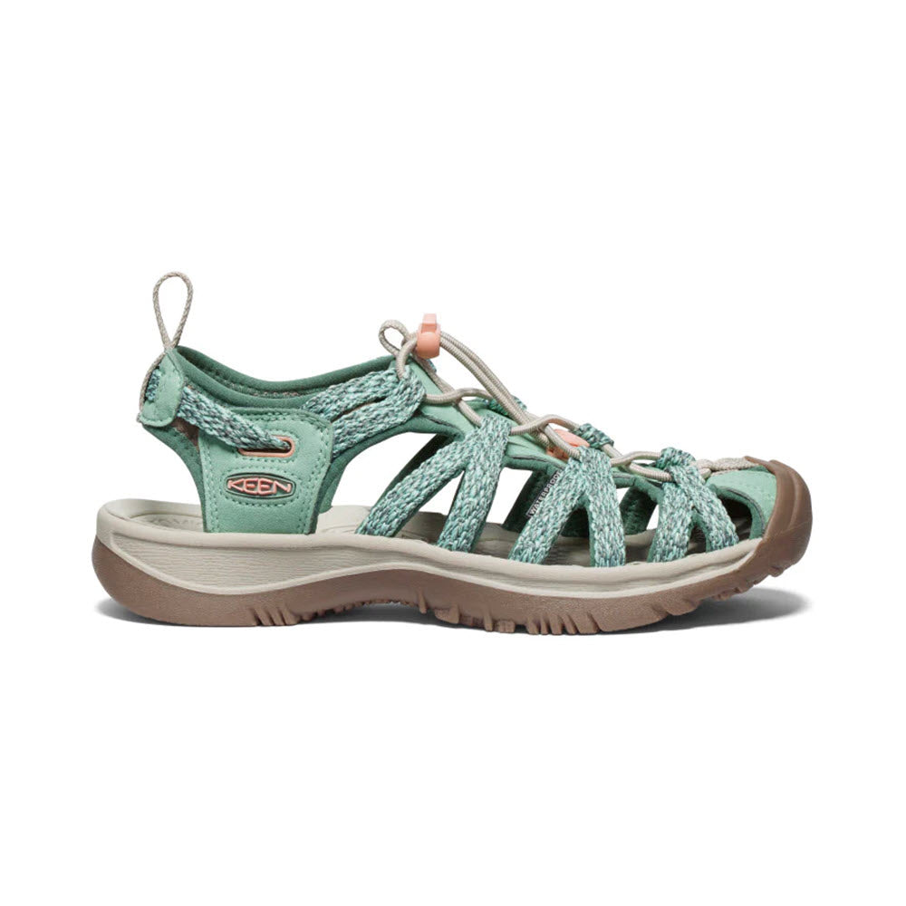 A single Keen Whisper Granite Green women&#39;s adventure sandal with intricate webbing and a rubber sole, isolated on a white background.