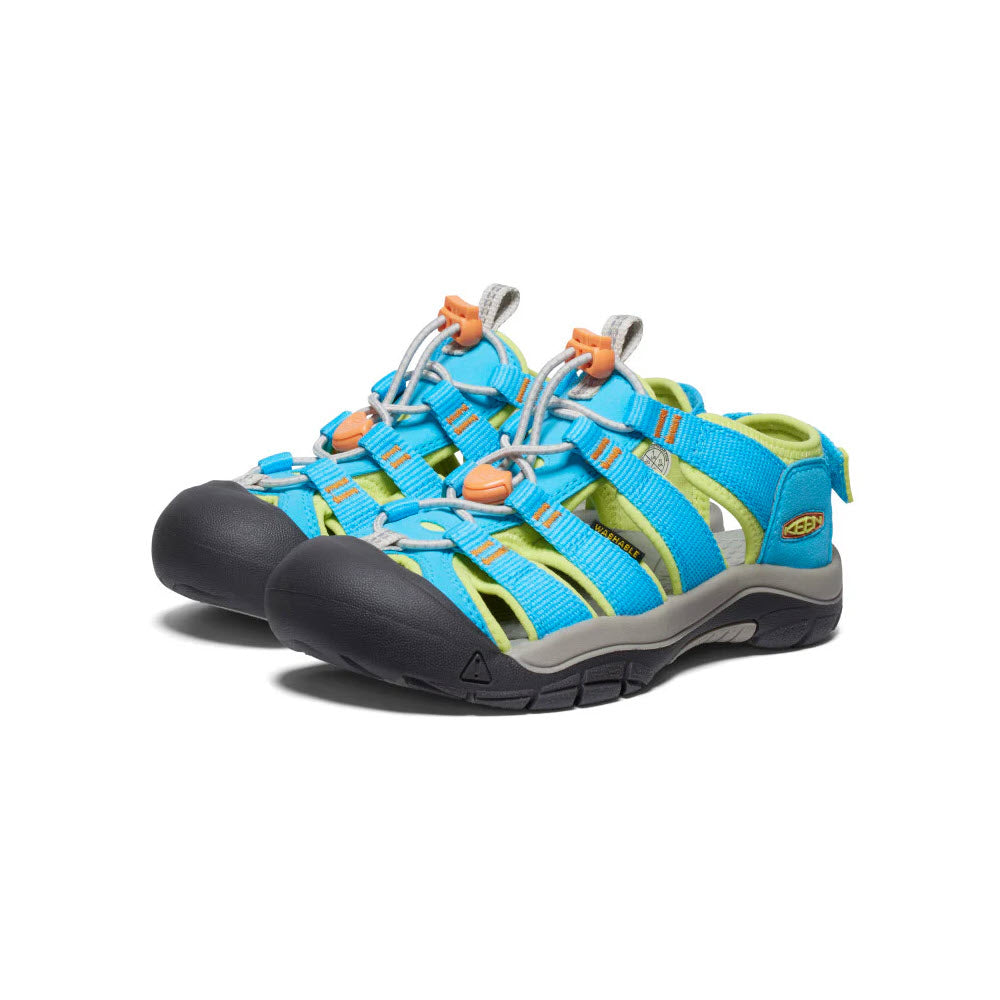 A pair of Keen Newport Boundless Youth Blue Atoll kids&#39; adventure sandals with blue, green, and orange straps, featuring a closed toe and robust sole.