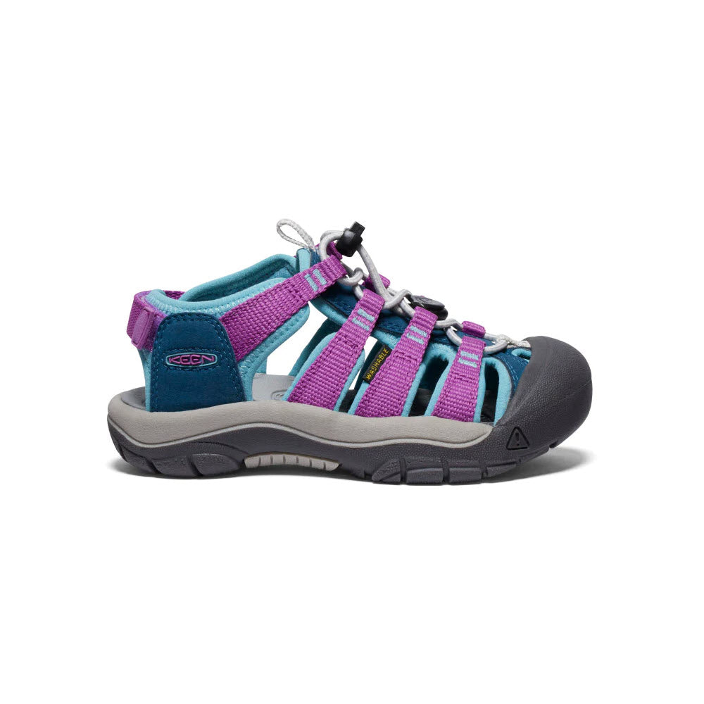 A single Keen kids&#39; adventure sandal featuring a grey and purple color scheme with textile straps, an adjustable heel strap, rubber toe cap, and a contoured footbed.