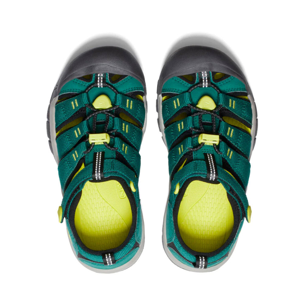 Top view of a pair of Keen Newport H2 Child Adventurine sandals with bright yellow insoles and bungee laces.