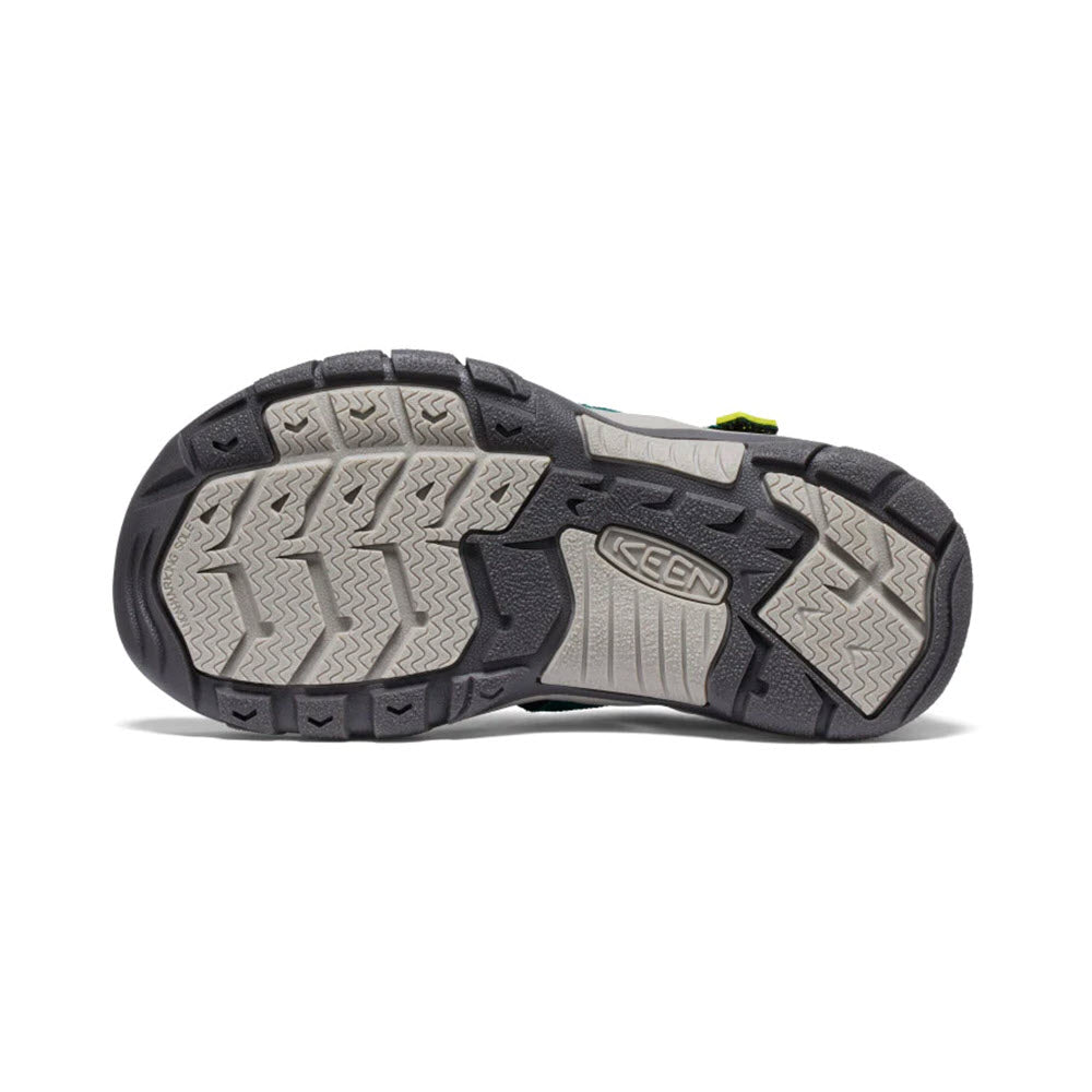 Treaded sole of a gray Keen Newport H2 Child Adventurine adventure sandal with black and yellow accents, displaying intricate grip patterns and brand logo.