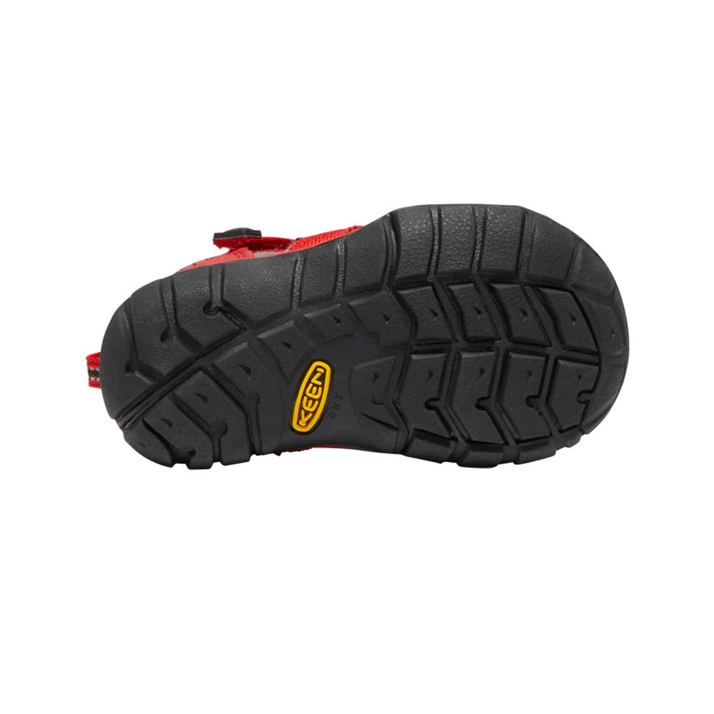 Bottom view of a black Keen SEACAMP II CNX Racing Red - Toddler hybrid water sandal sole with a distinctive tread pattern and visible brand logo.