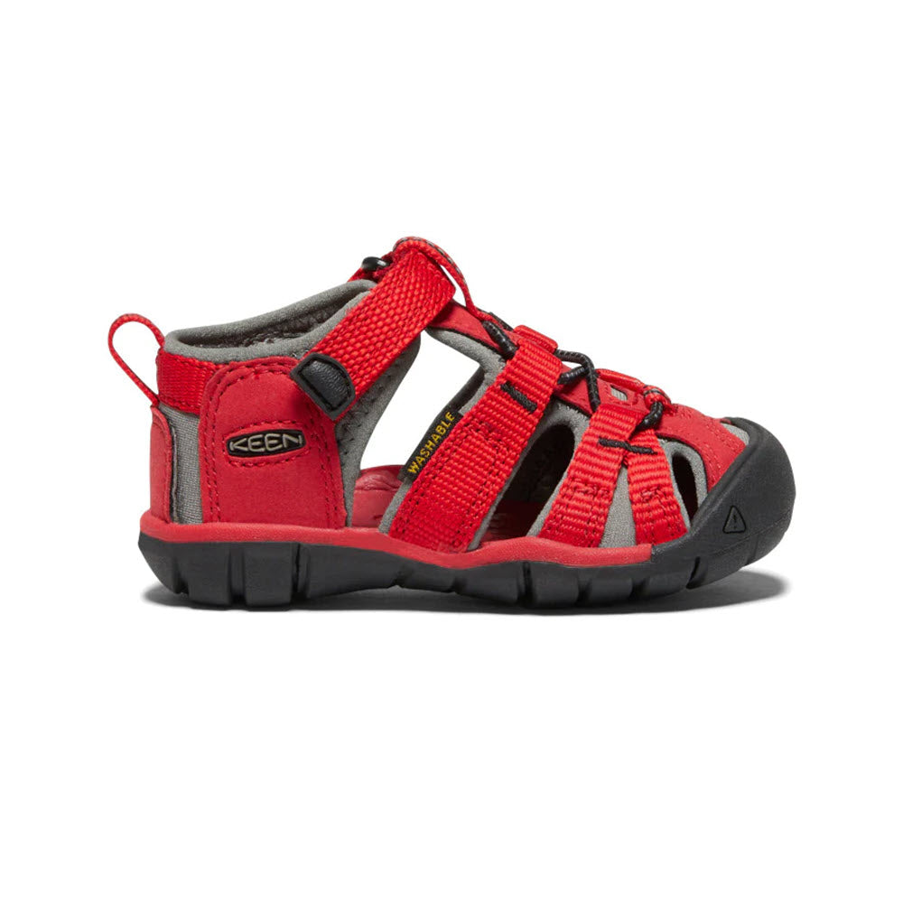 Red Keen Seacamp II CNX Racing Red Toddler hybrid water sandal with black accents, featuring an open-toe design and velcro strap, displayed on a white background.